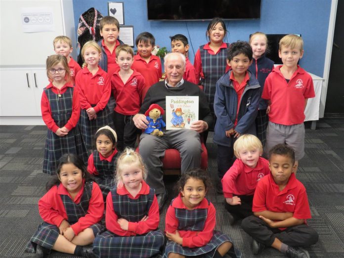 Viv Barett QSM reads to students at Our Lady of the Snows school