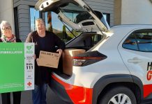 AED secured with Red Cross